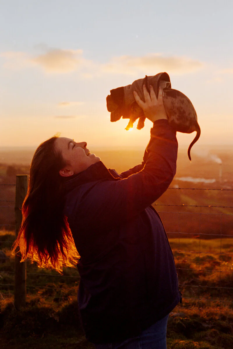Beth playing with Freddie at sunset