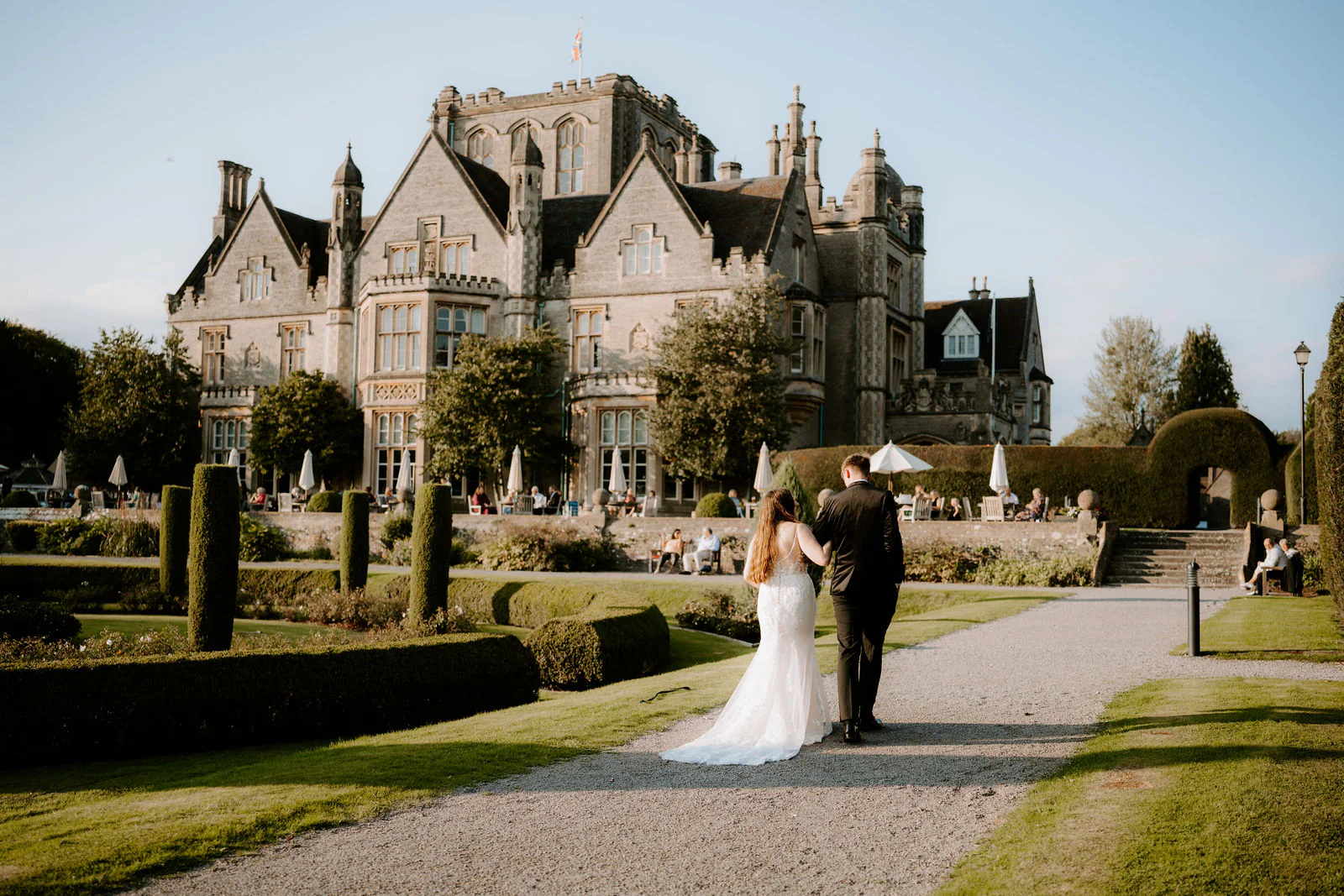 De Vere Tortworth Court | Bright Sight Photography & Film Romantic wedding couple portrait stroll in the historic grounds at De Vere Tortworth Court near Bristol