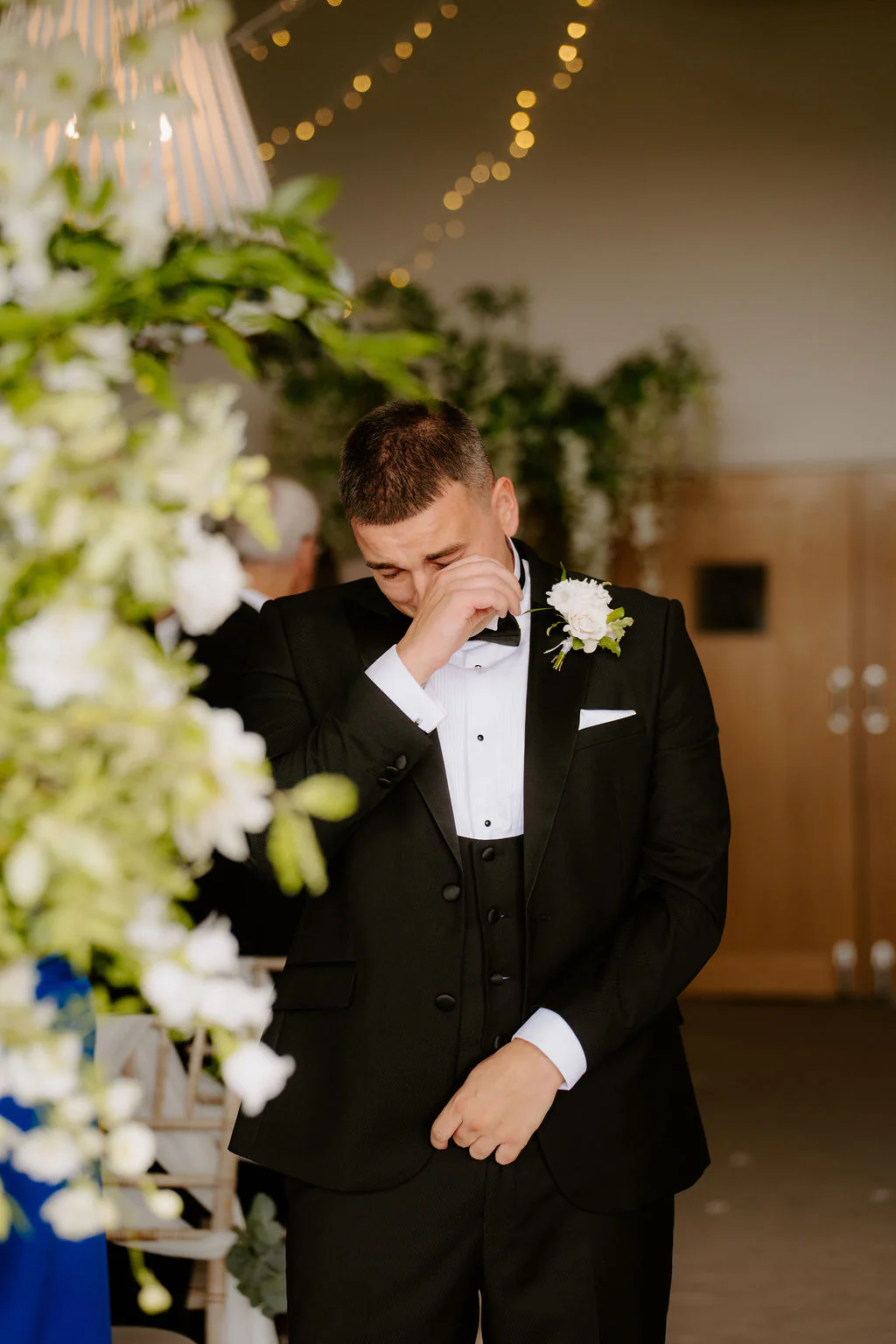 Llanerch Vineyard Wedding Photography & Film | Hensol, Vale of Glamorgan Bethan and James walking hand-in-hand between the vines at Llanerch Vineyard near Cardiff