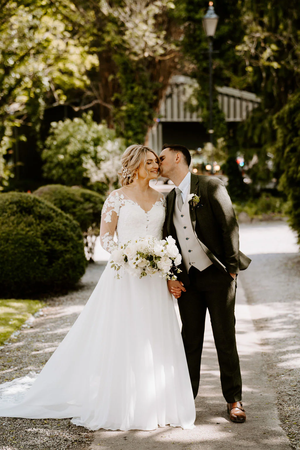 Pencoed House Estate Wedding Photography | Cardiff Robyn and Kris couple portrait by the stone walls at Pencoed House Estate