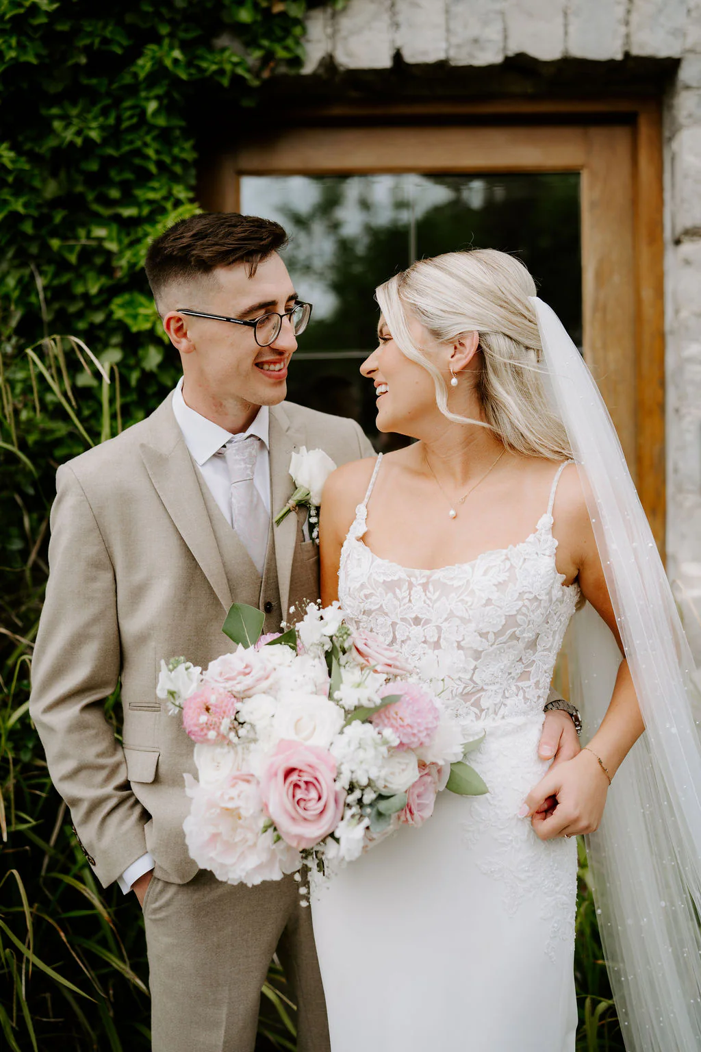 Rosedew Farm Wedding Photographer & Videographer | Llantwit Major, Vale of Glamorgan Morgan and Kate relaxed wedding portrait in the fields at Rosedew Farm in Llantwit Major