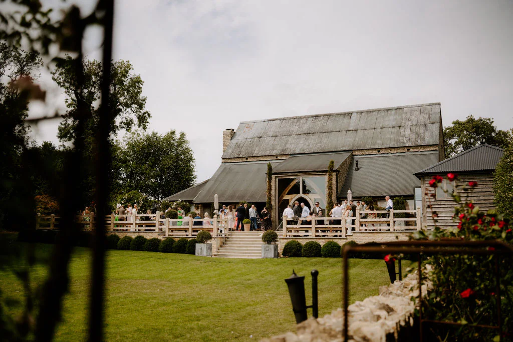 Cripps Barn Wedding Videographer Cripps Barn Cirencester couple portrait by Cotswolds wedding photographer