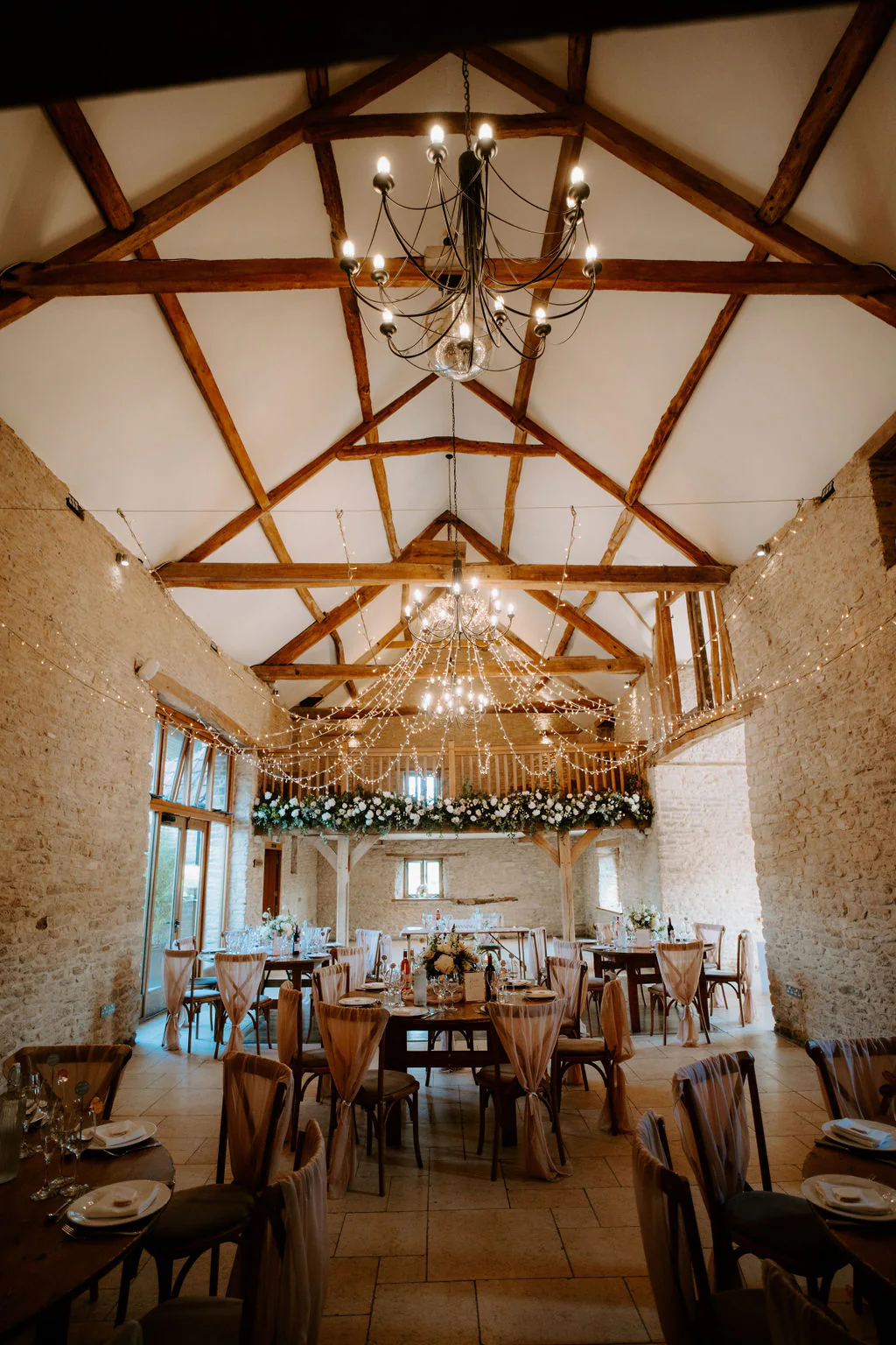 The Kingscote Barn Wedding Photography The Kingscote Barn Tetbury champagne drinks reception