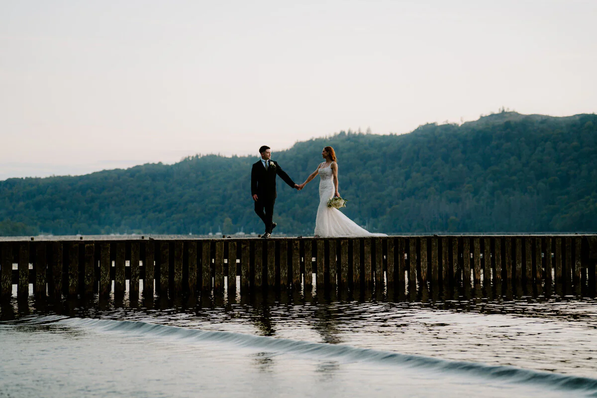 A couple sharing a quiet moment outside their wedding venue