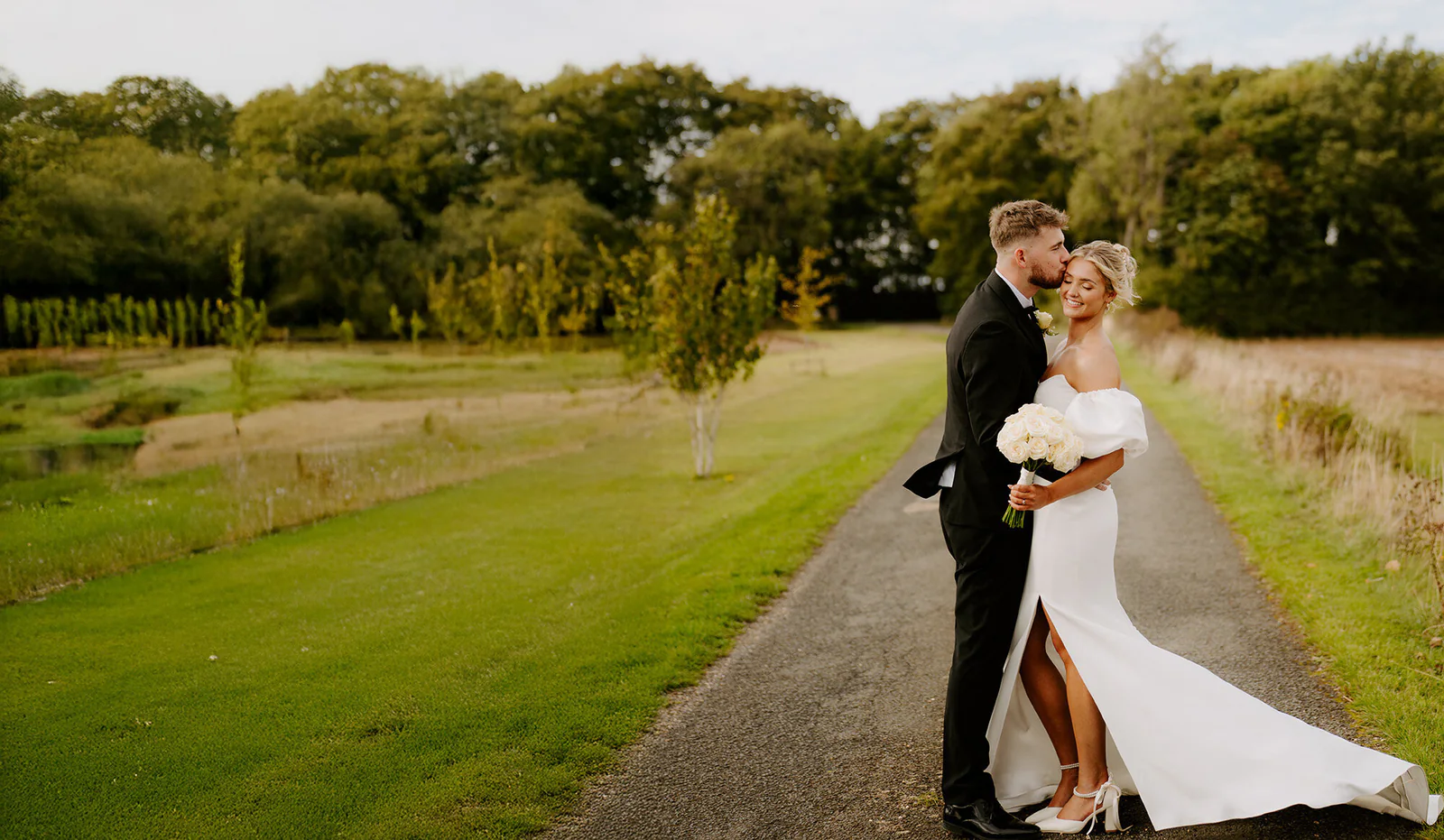 Newlyweds photographed in warm evening light