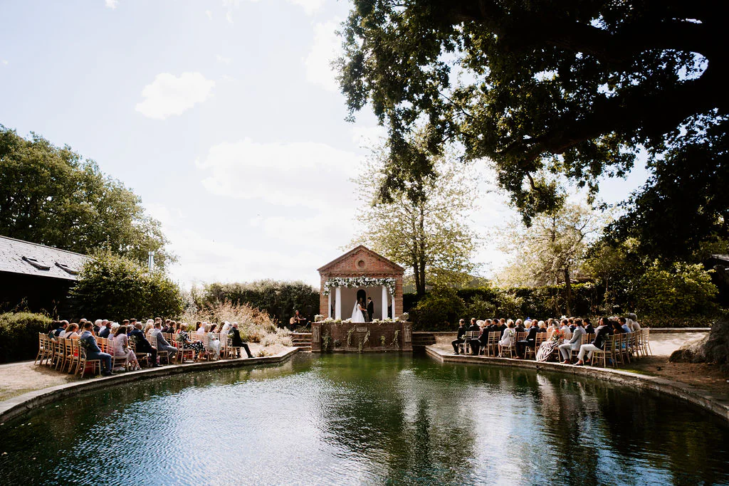 Pennard House Wedding Photography & Film | Shepton Mallet, Somerset Charlotte & Matt outdoor garden wedding ceremony beneath the ancient trees on the lawn at Pennard House in Shepton Mallet