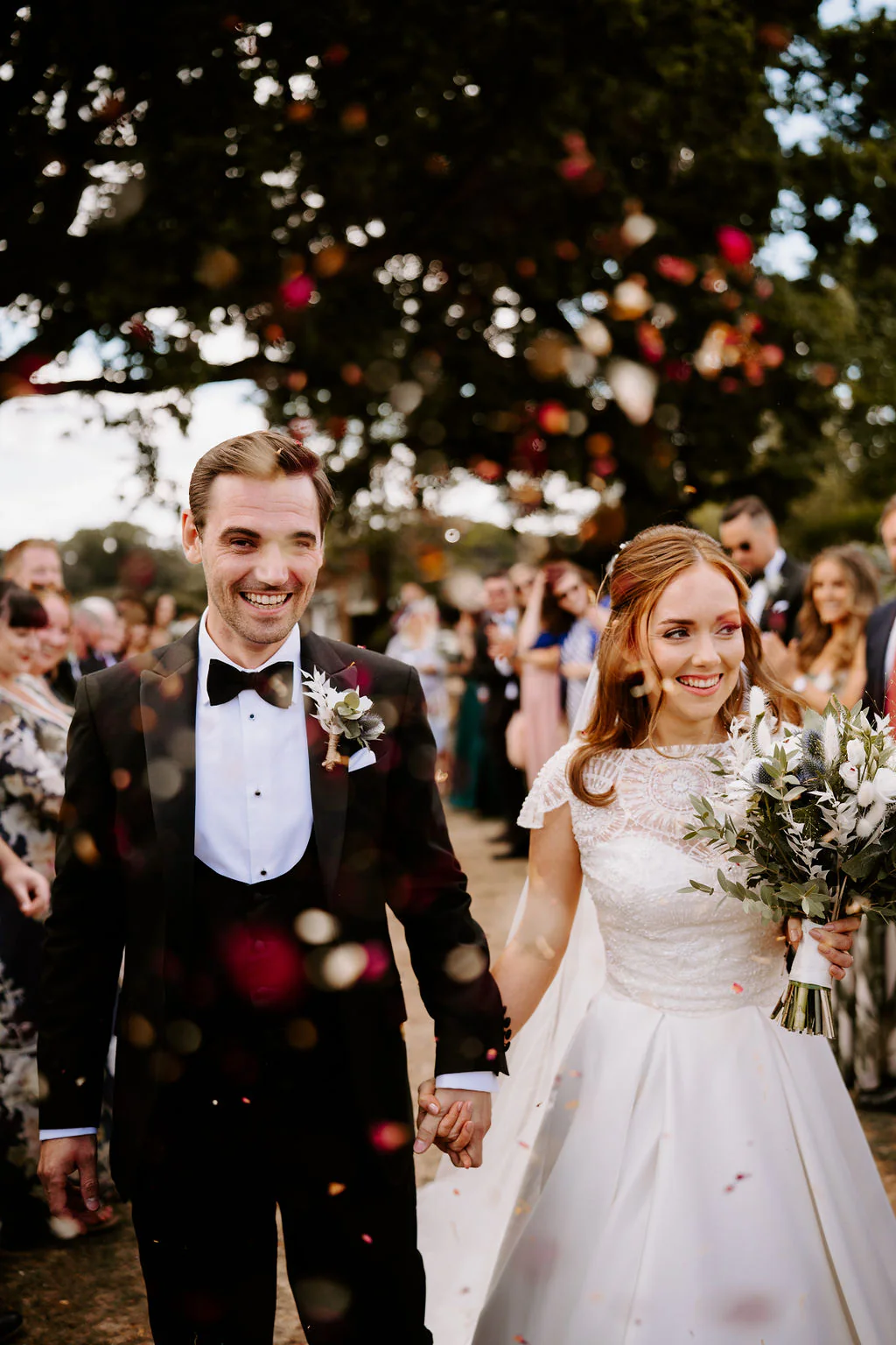 Pennard House Wedding Videographer & Photographer | Shepton Mallet Charlotte & Matt romantic portrait in the rose gardens at Pennard House in Shepton Mallet