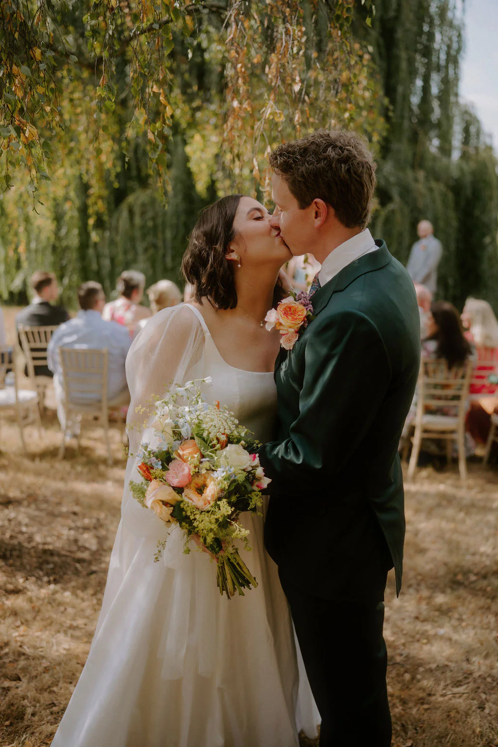 Talton House Wedding Moments | Warwickshire Taylor & Brodie laughing together during afternoon reception drinks at Talton House