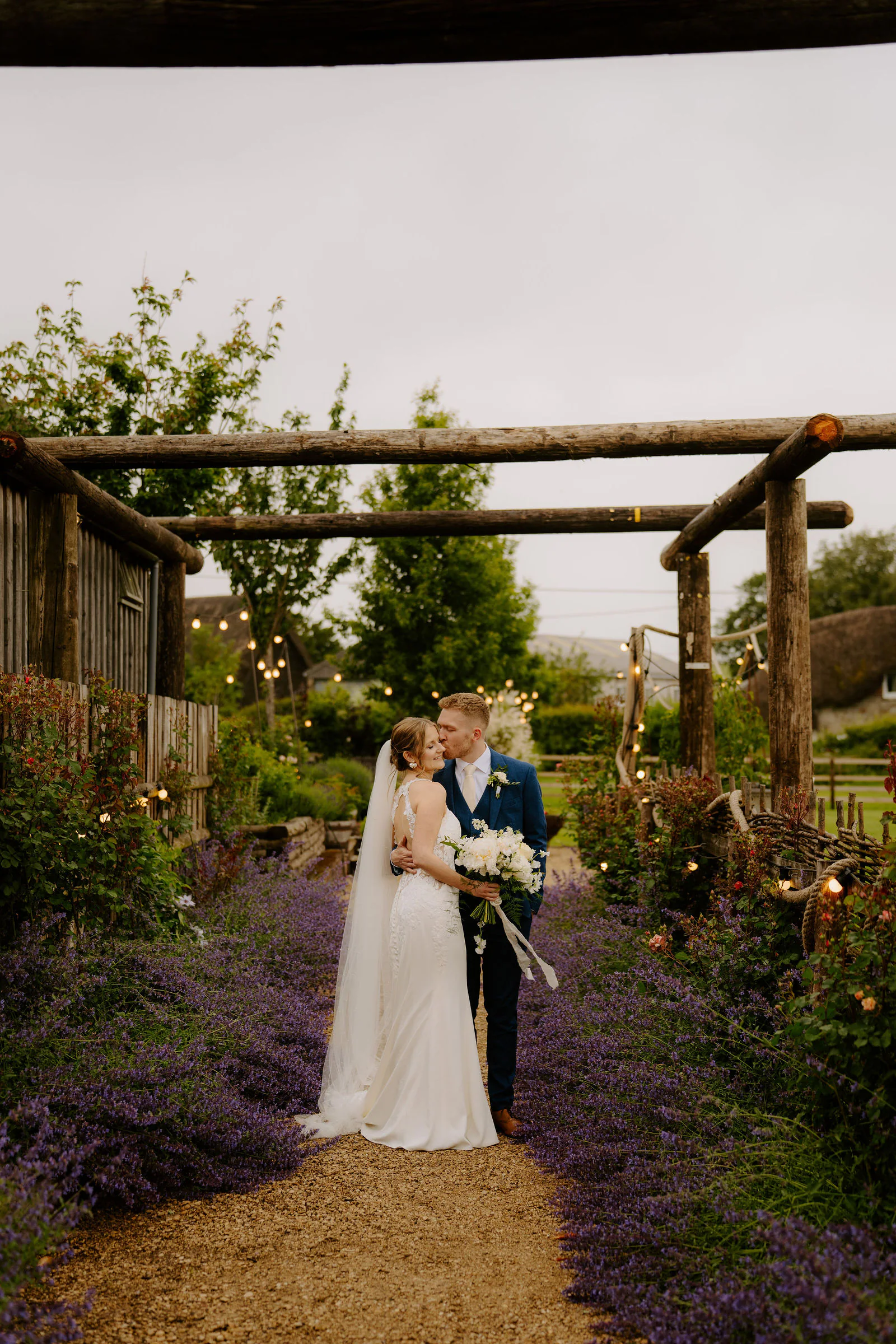 Bowerchalke Barn Golden Hour Embrace | Wiltshire Vanessa and Harvey romantic golden hour embrace in the Wiltshire fields at Bowerchalke Barn