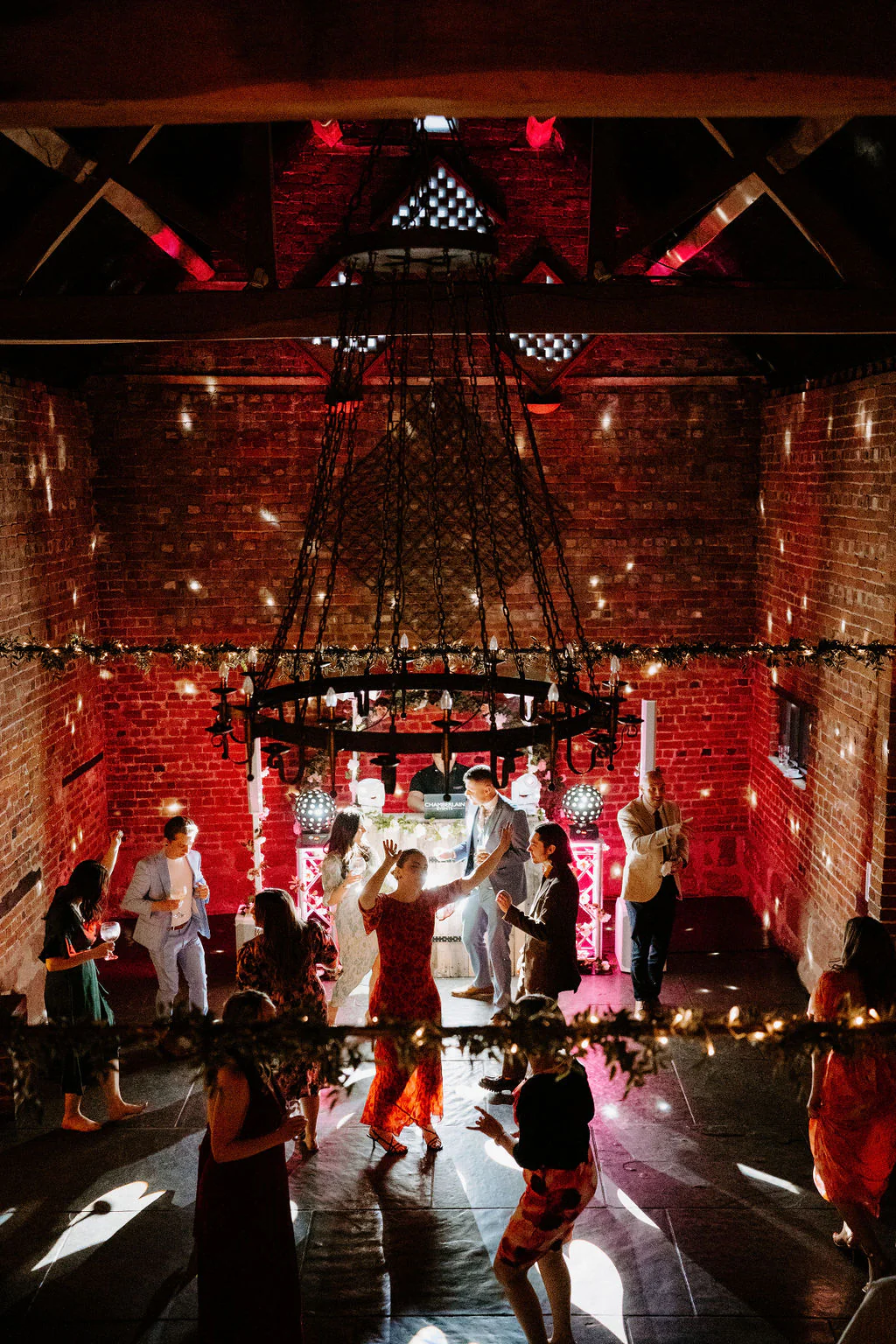 Curradine Barns Wedding Photographer & Videographer | Shrawley Amy & Matthew smiling together during drinks reception in the courtyard at Curradine Barns